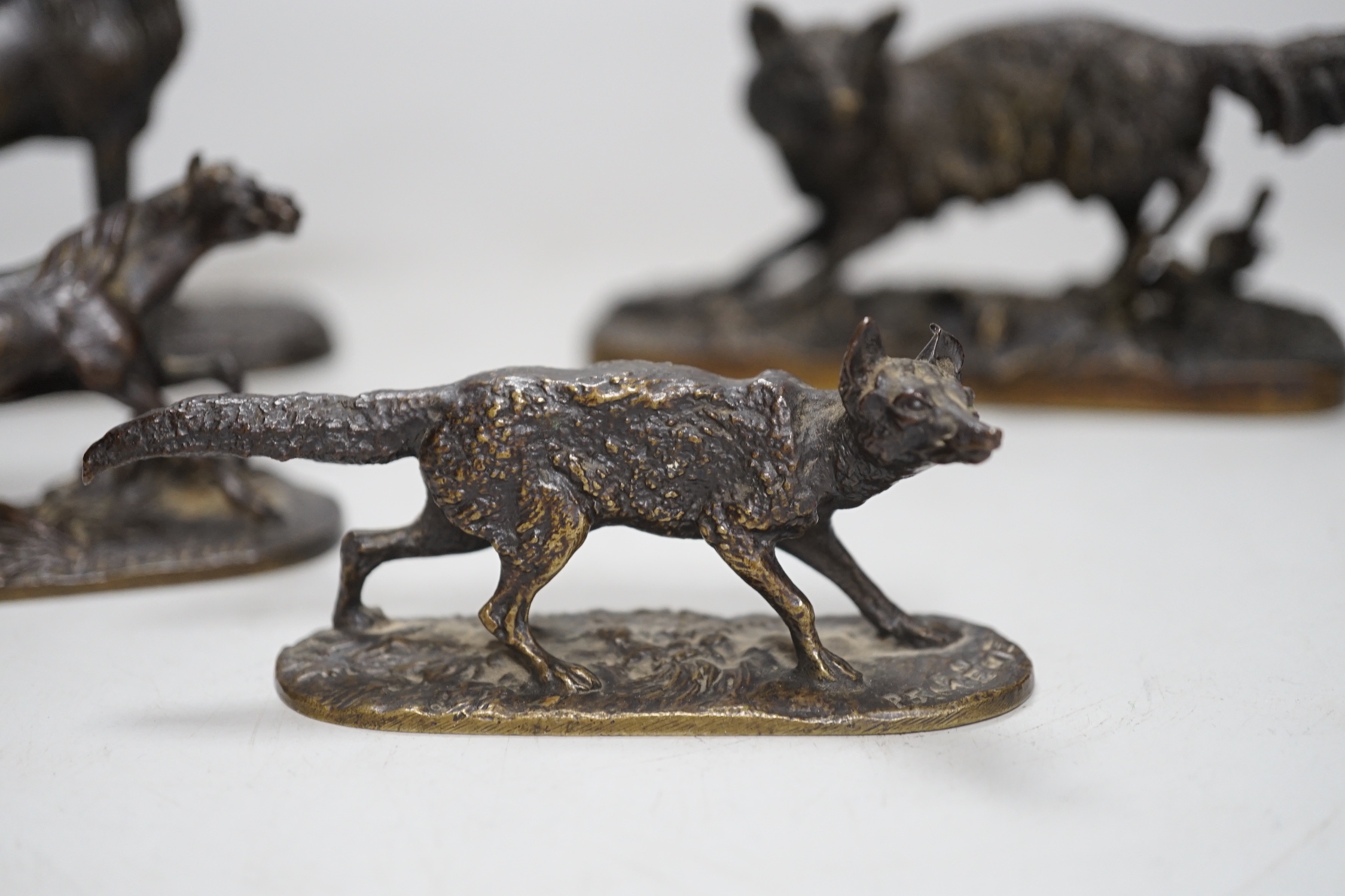 After Pierre-Jules Mêne (1810 – 1879) Four bronze models of foxes and horses, the largest 12.5cm wide